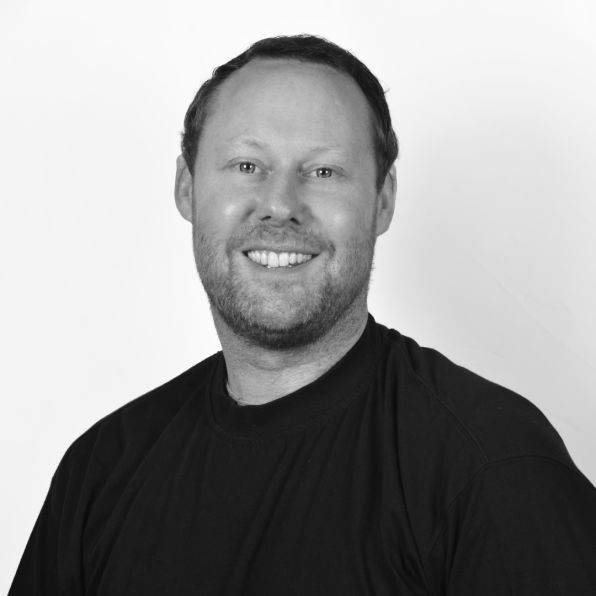 male Actor headshot  in Black and white  ground 