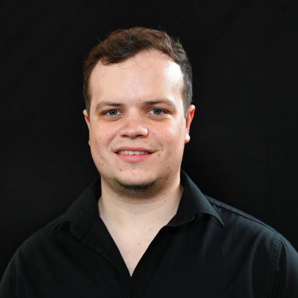 male Actor headshot  with Black back ground 