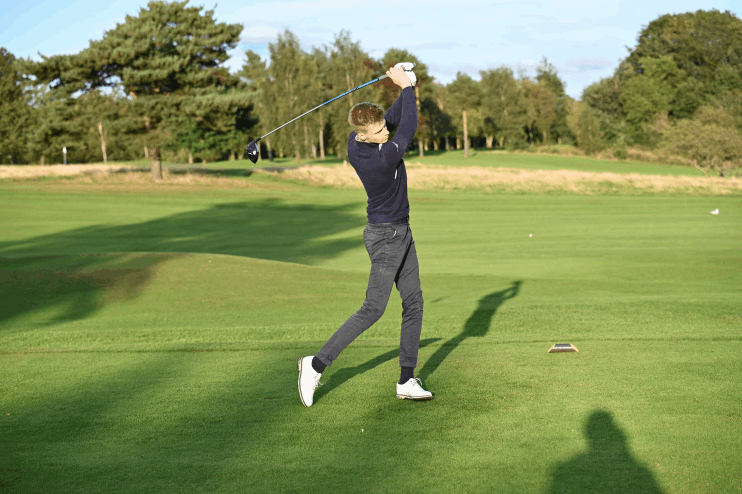 male golfer hitting the ball of the tee on a Corporate Golf Day 